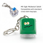 Close-up of LED keycap keychain showing the mechanical switch, lighting and metal attachment