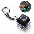 Custom clickable LED keycap keychain with green keycap, printed design and metal chain